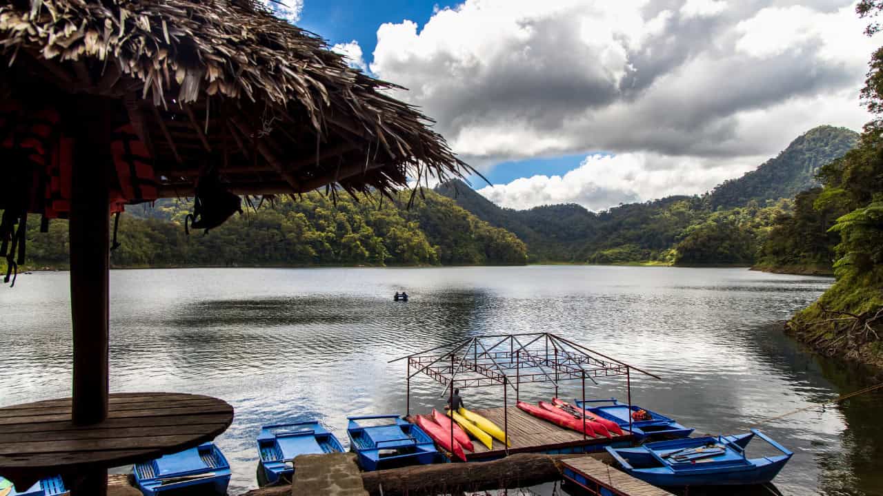things to do in dumaguete - Things to Do in Dumaguete: A Traveler’s Guide to the City of Gentle People Boats on the Twin Lakes of Balinsasayao.