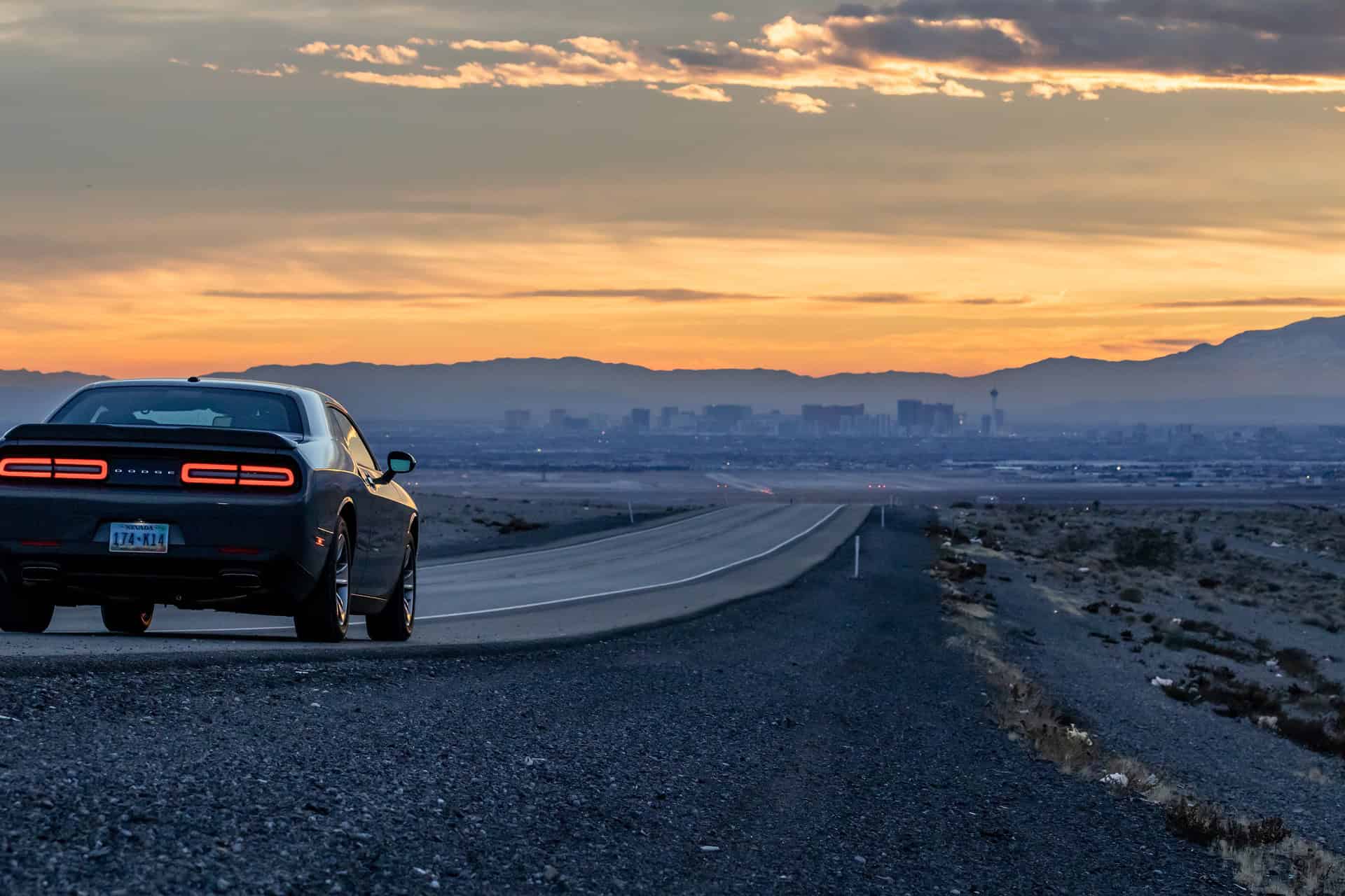 - Money-Saving Tips for Your Next Trip Stateside A Dodge on the road to Las Vegas.