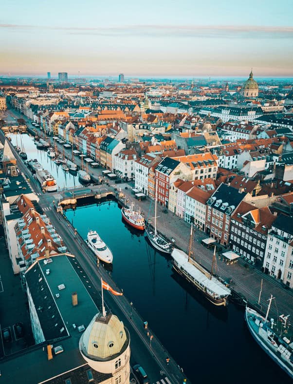 most accessible cities - The Most Accessible Cities in the World Aerial photo of boats in Copenhagen, Denmark.