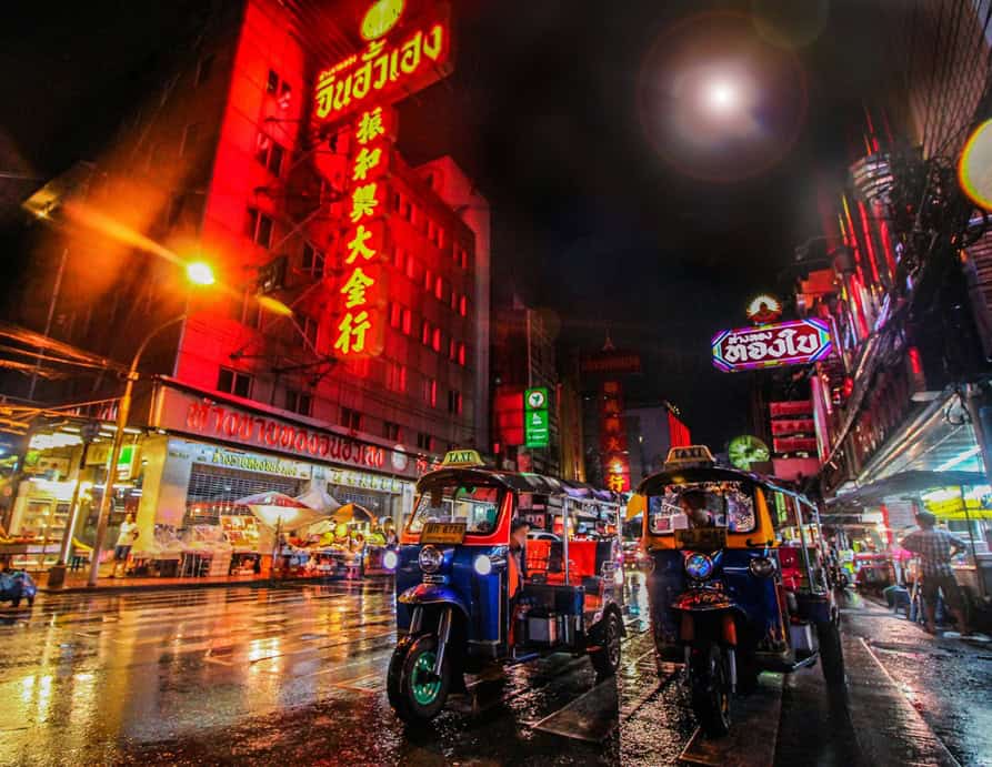 songkran festival - Why Thailand’s Songkran Festival Should Be on Your Travel Bucket List Tuk-tuks and wet roads in Bangkok.