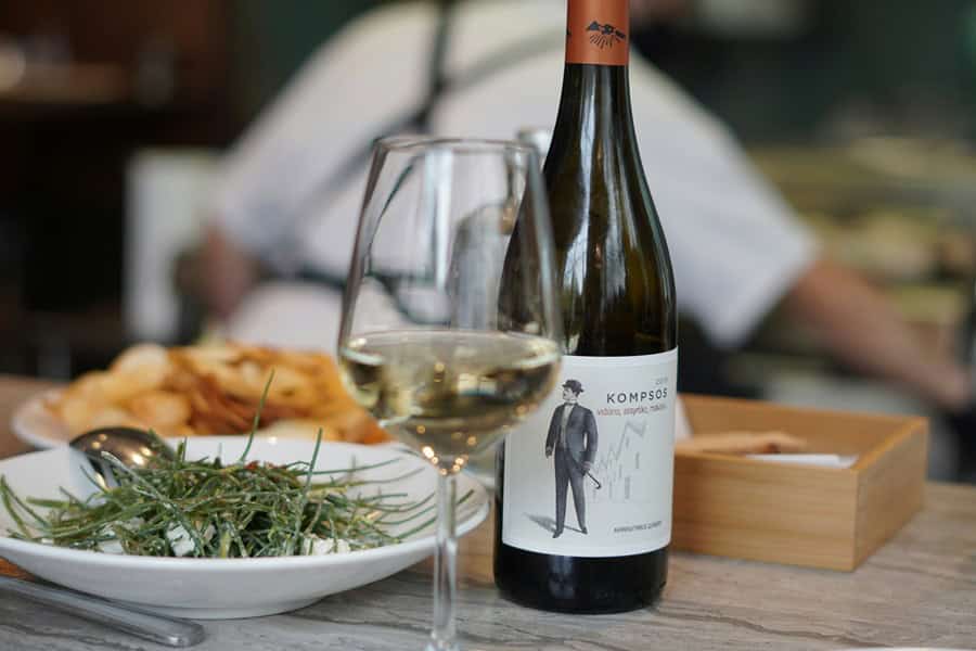 visiting greece - Visiting Greece: Good Things To Know and Common Phrases Food and wine at a Greek restaurant.