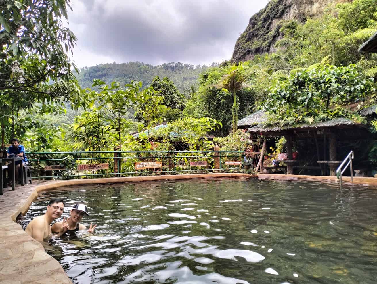 things to do in dumaguete - Things to Do in Dumaguete: A Traveler’s Guide to the City of Gentle People People relaxing at Redrock Hot Spring.