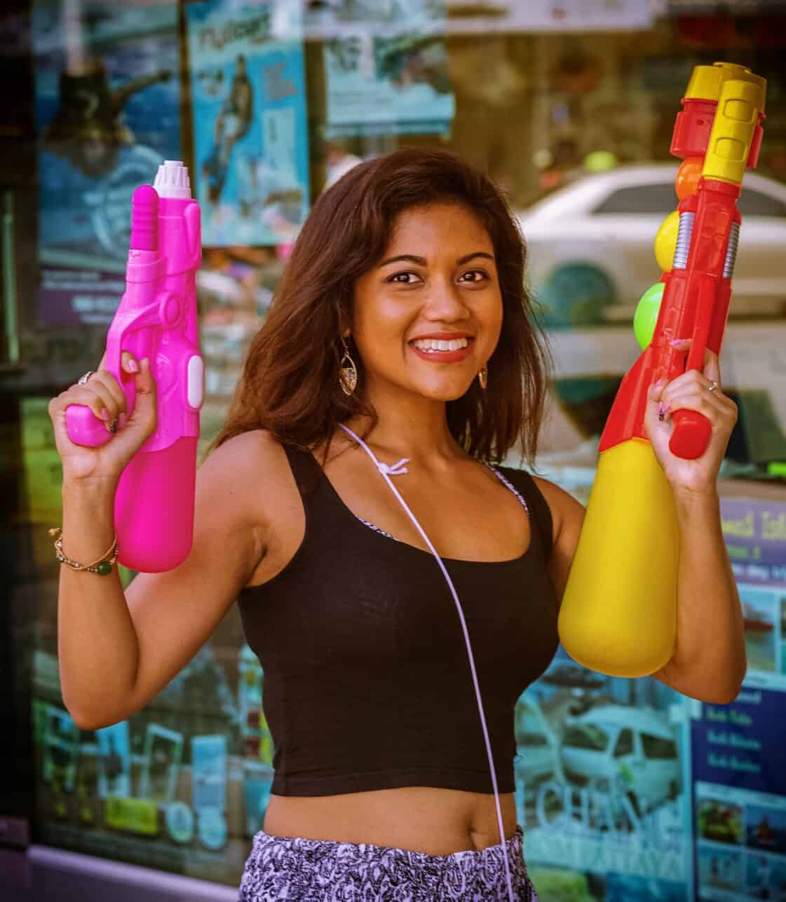 songkran festival - Why Thailand’s Songkran Festival Should Be on Your Travel Bucket List Ready with water guns for Songkran in Pattaya, Thailand.