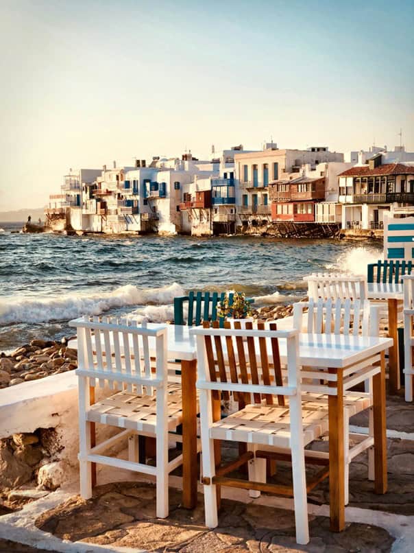 visiting greece - Visiting Greece: Good Things To Know and Common Phrases A restaurant overlooking the water in Mykonos.