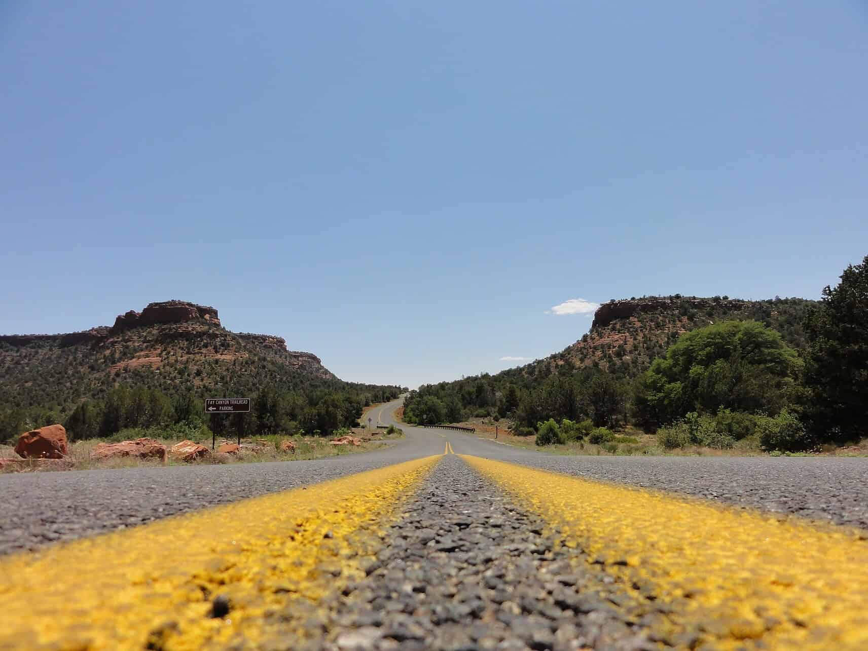 - Money-Saving Tips for Your Next Trip Stateside Road at Fay Canyon trailhead in Sedona, Arizona.