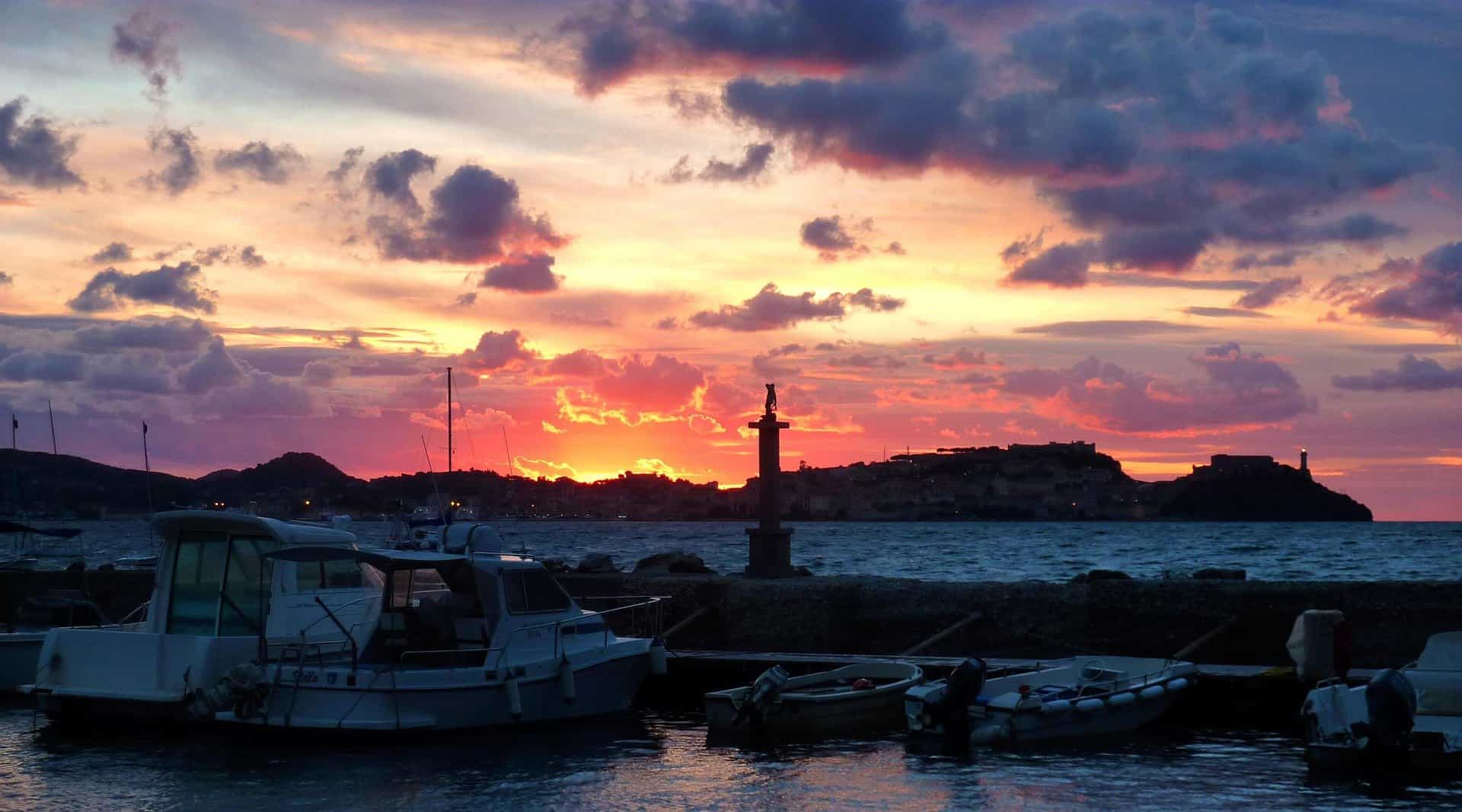 - Discover Elba, Italy: Best Ferry Routes and Tips Sunrise at Portoferraio in Elba, Italy.