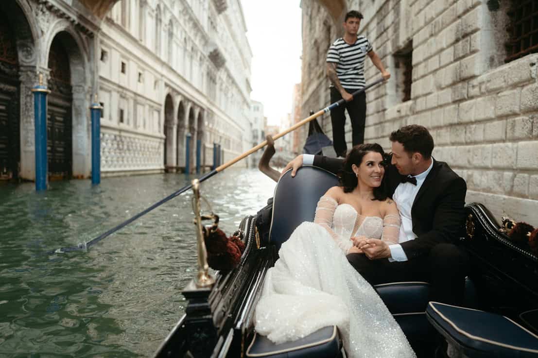 destination wedding - How to Choose the Right Destination Wedding Location (When Everyone Tells You Something Different) A married couple in a gondola in Venice.