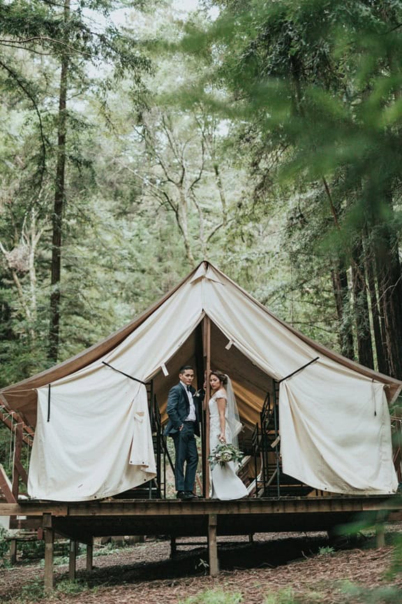 destination wedding - How to Choose the Right Destination Wedding Location (When Everyone Tells You Something Different) A married couple in a tent in the bush.